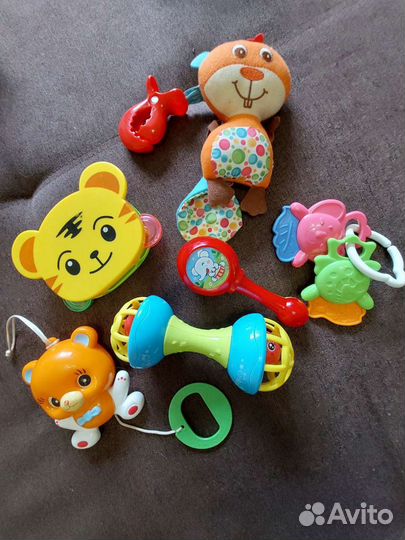 Детские игрушки погремушки