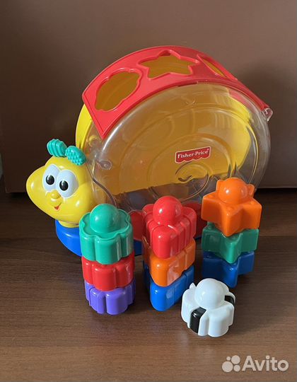 Развивающая муз.игрушка Сортер Улитка Fisher Price