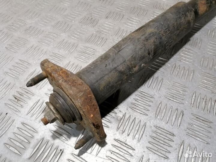 Амортизатор задний левый Mazda Cx7 2007-2012