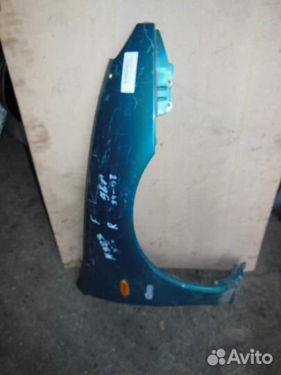 Крыло переднее правое Mazda 323