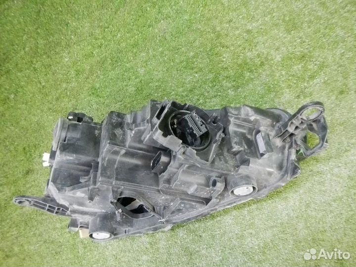 Фара левая Skoda Rapid