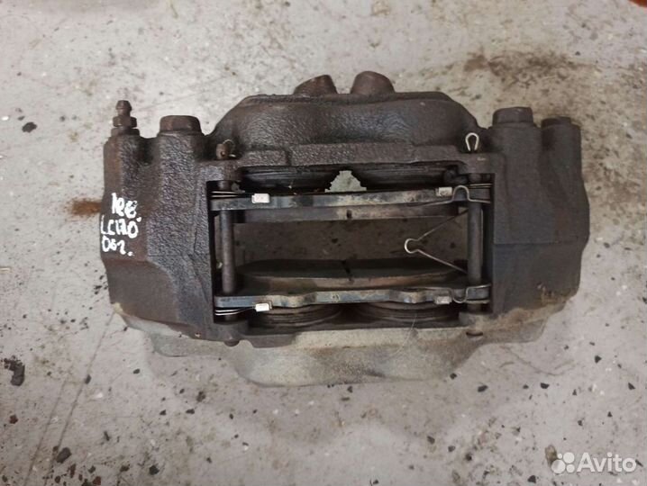 Тормозной суппорт передний левый Land Cruiser Prad