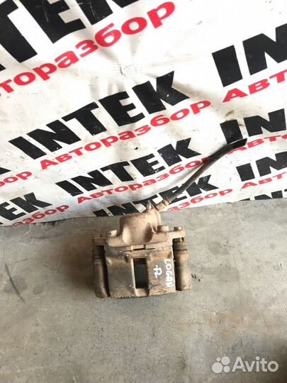 Суппорт передний левый Renault Logan