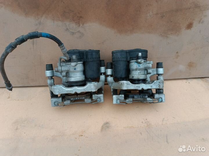 Тормозной суппорт задний Mazda 3BP.оригинал