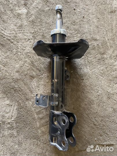 Амортизатор передний левый Toyota Corolla 120