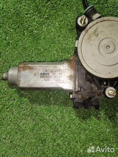 Моторчик стеклоподъемника Mazda 323