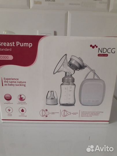 Молокоотсос электрический новый