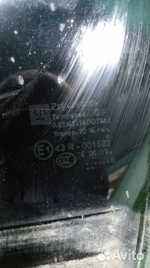 Стекло двери задней левой Opel Astra