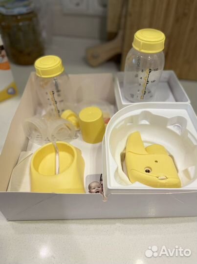 Молокоотсос Medela mini electric