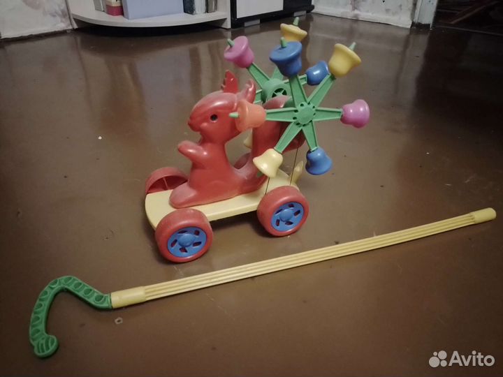 Юла, каталка на палке