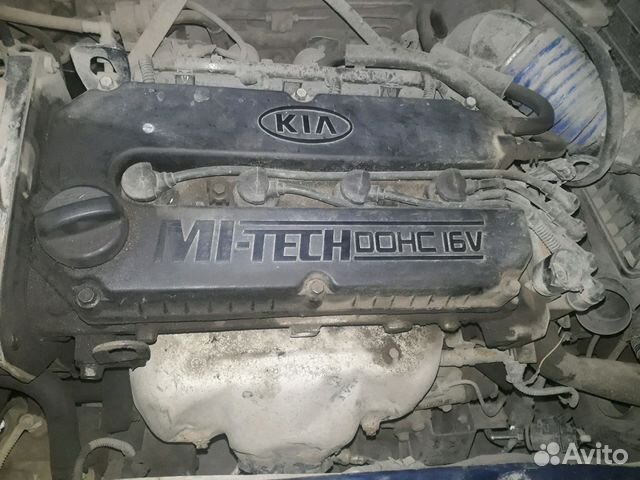 где находится номер двигателя kia spectra