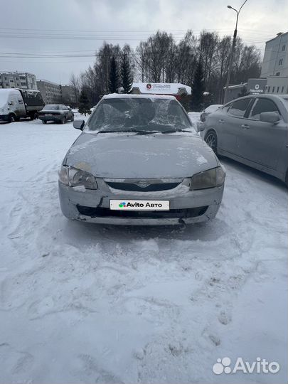 Mazda Familia 1.5 AT, 1999, 100 000 км