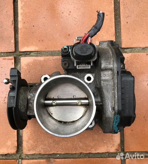 Заслонка дроссельная VW Passat B5 058133063M