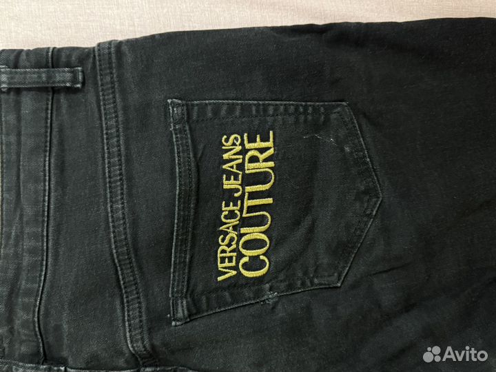 Джинсы versace
