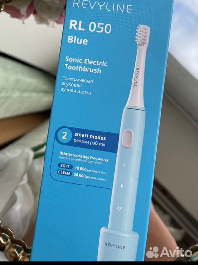 Электрическая зубная щетка