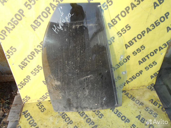 Стекло двери задней левой Daewoo Nubira 1997-1999