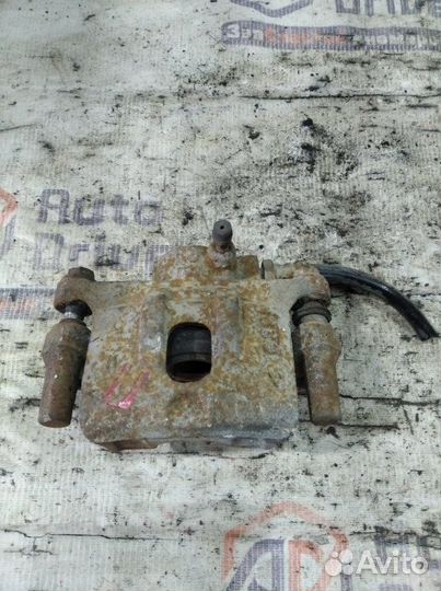 Суппорт тормозной задний правый Mitsubishi Lancer