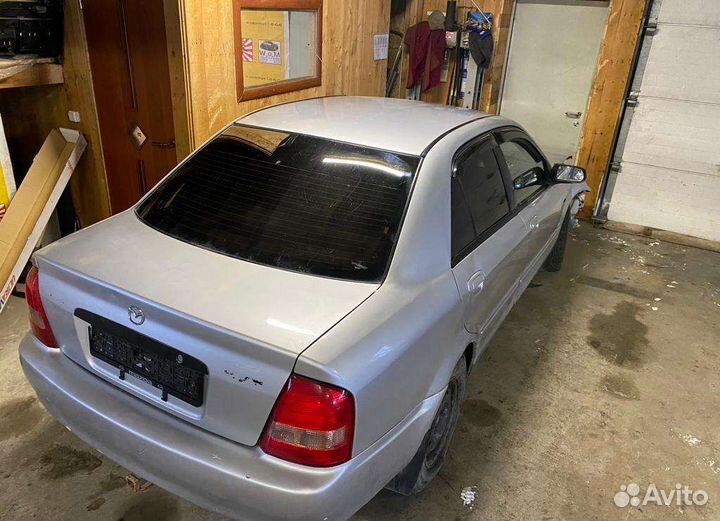 Запчасти на мазду протеже