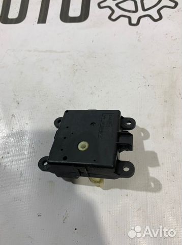 Моторчик заслонки отопителя Nissan Primera P12 1.6