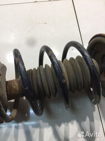 Амортизатор (передний, левый) (Ford Focus I)