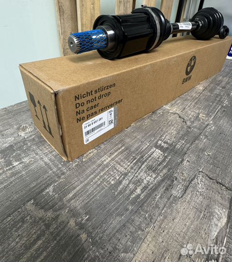 31608657291 Приводной вал лев BMW