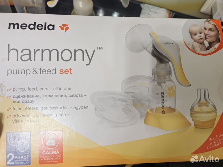 Молокоотсос ручной Medela, бутылочки, соска calma