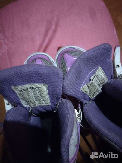 Роликовые коньки