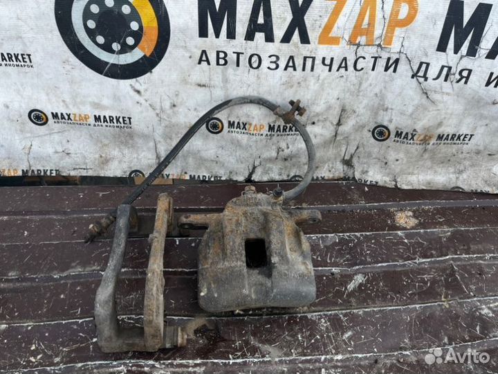 Суппорт передний правый Suzuki Grand Vitara 2