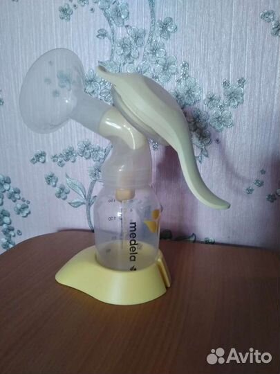 Молокоотсос ручной medela