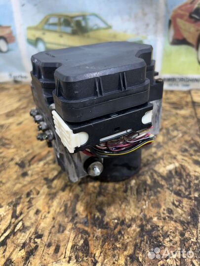 Блок ABS Мицубиси L200 4пок