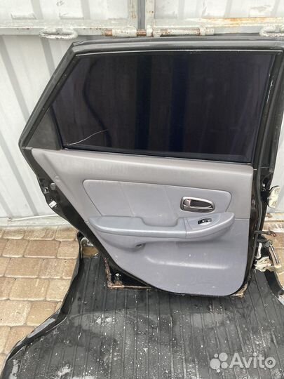 Задняя левая дверь Hyundai Elantra xd универсал