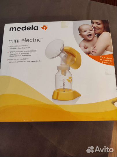 Молокоотсос medela электрический