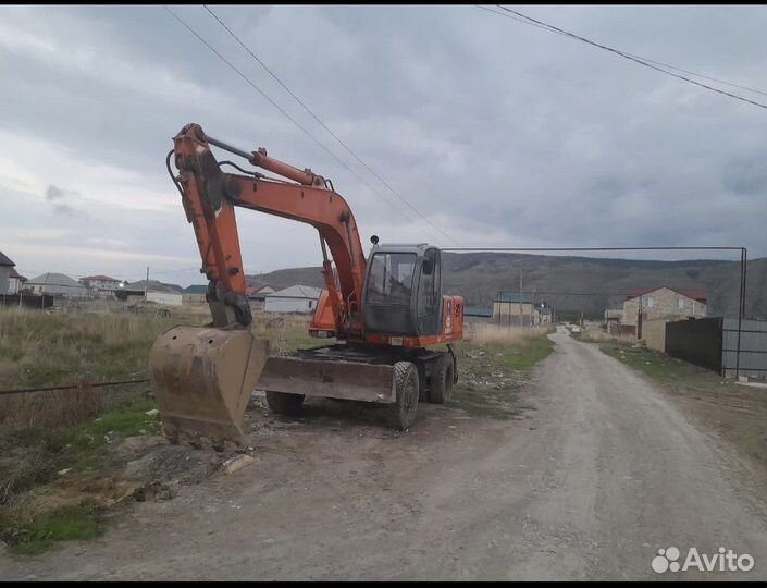 Колёсный экскаватор Твэкс ЕК 14-20, 2012