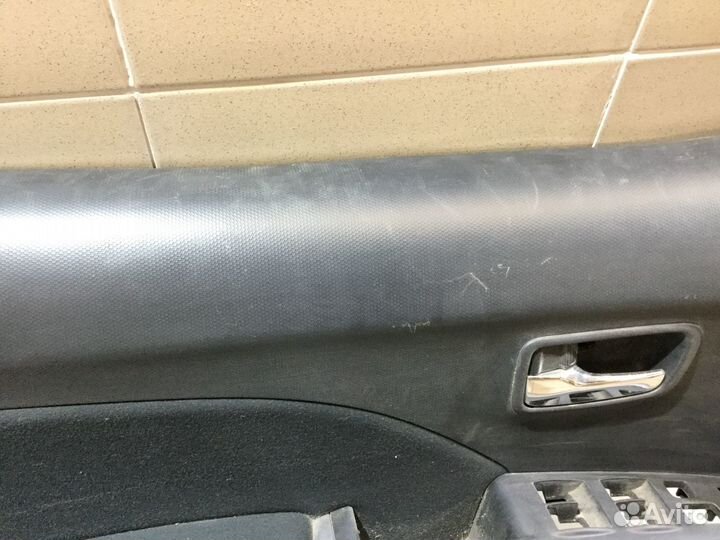 Обшивка двери передней левой Аутлендер XL