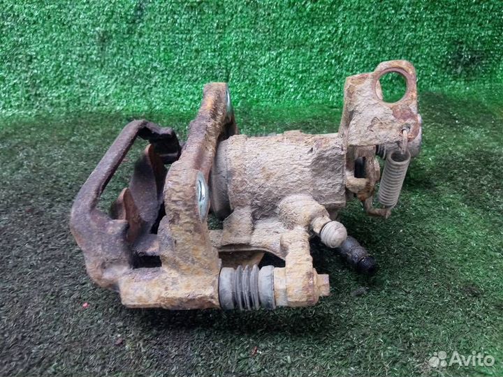 Суппорт задний левый Opel Astra J (2010-2016)