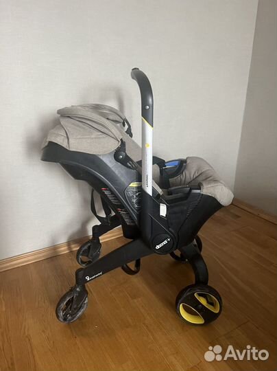 Коляска автокресло doona с базой isofix