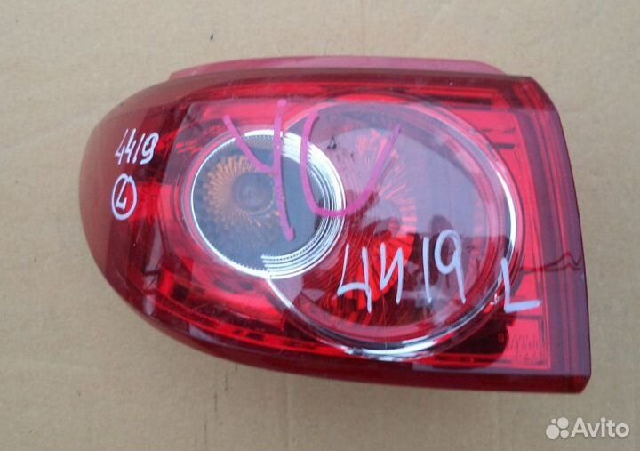 Фонарь левый задний левый Mazda Demio DY 2002-2004