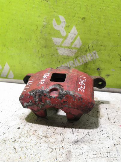 Суппорт передний правый Митсубиси Лансер 10