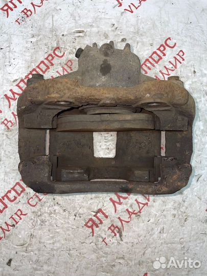 Суппорт тормозной передний левый Peugeot 207 EP6