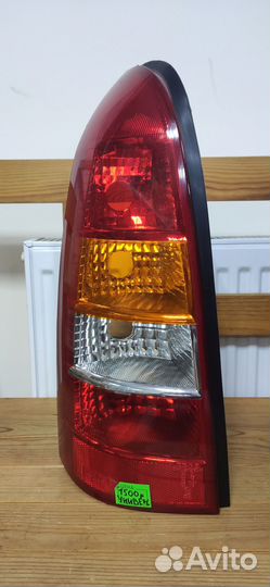 Фонарь задний левый opel astra G универсал