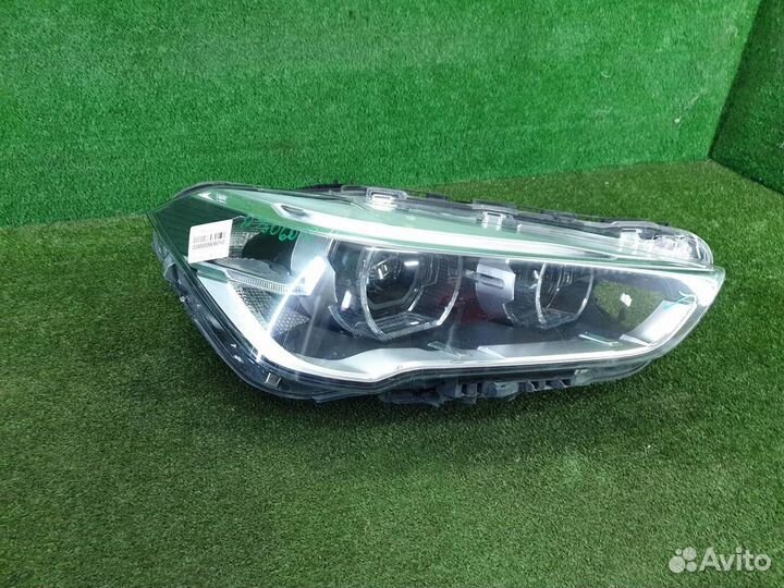 Фара правая BMW X1