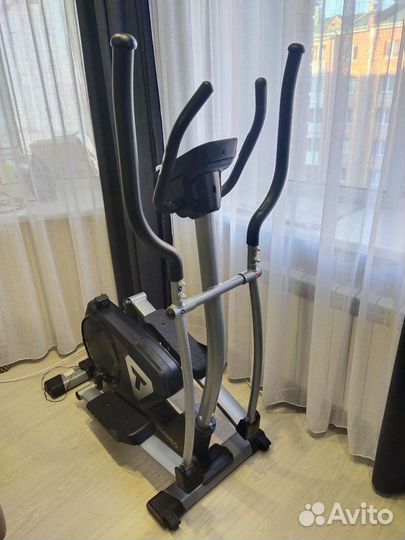 Эллиптический тренажер torneo