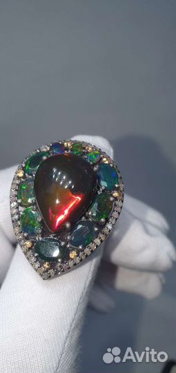 Серебряное кольцо с черными опалами
