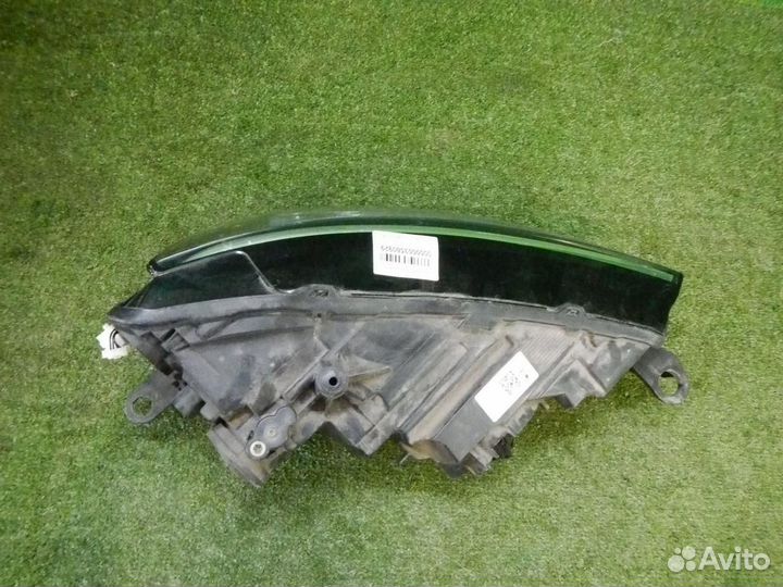 Фара левая Skoda Rapid