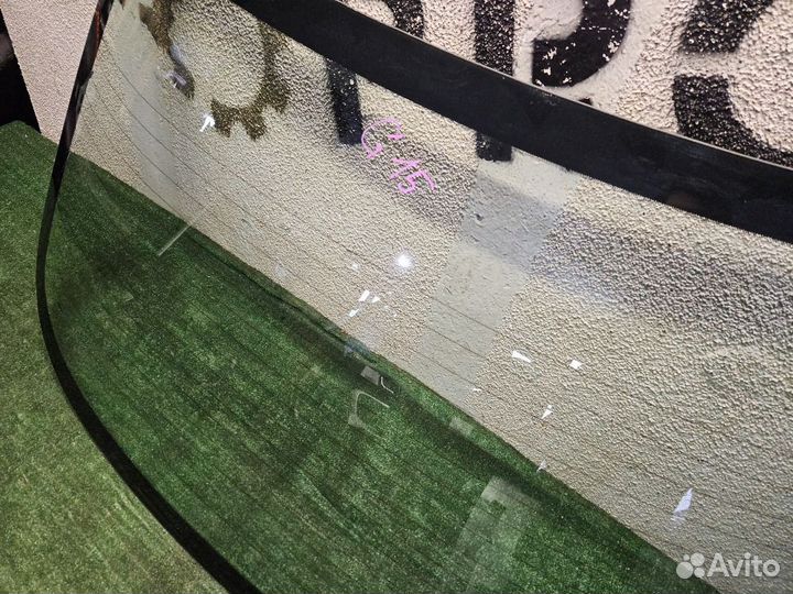 Стекло заднее на Almera G15