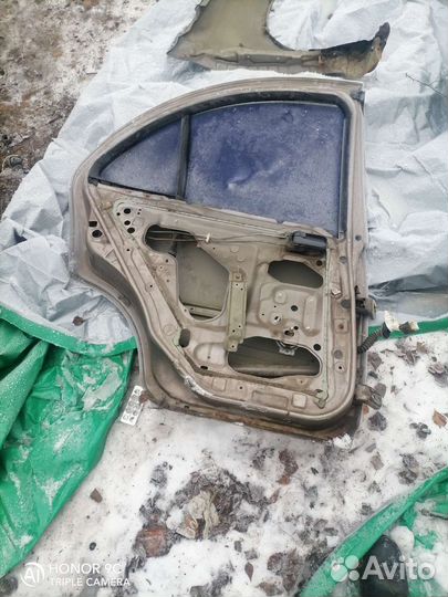 Дверь задняя левая nissan almera n16