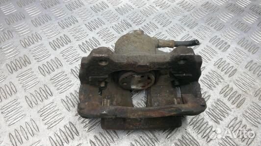 Суппорт тормозной передний правый opel corsa D (UB