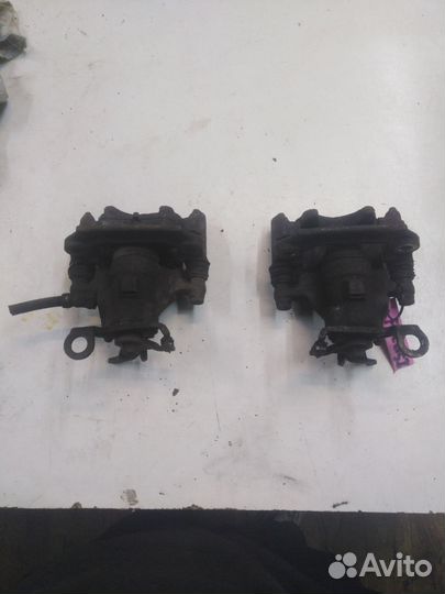 Суппорта задние Ford Focus 1 R/L