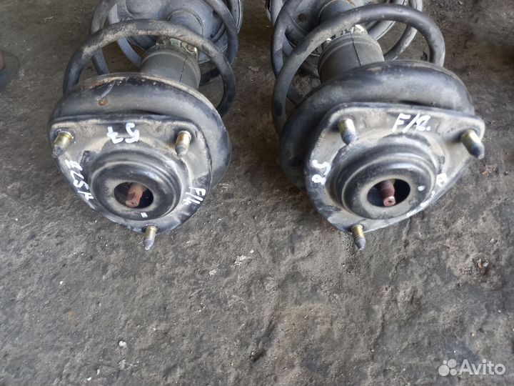 57 Стойка амортизатора F/L Mitsubishi Colt Z25A