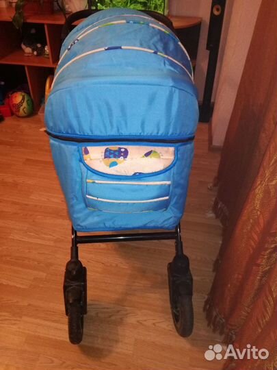 Коляска трансформер с поворотными колесами